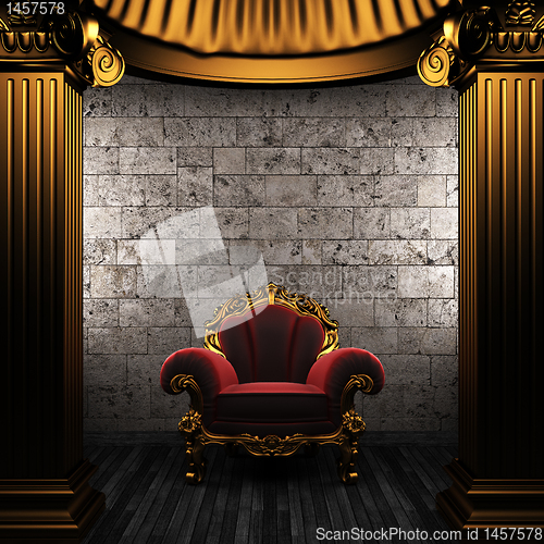 Image of bronze columns and chair