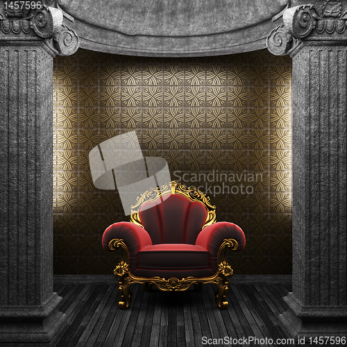 Image of stone columns, chair and tile wall