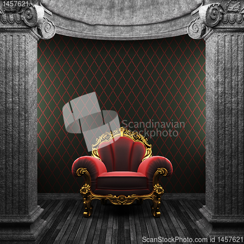 Image of stone columns, chair and wallpaper