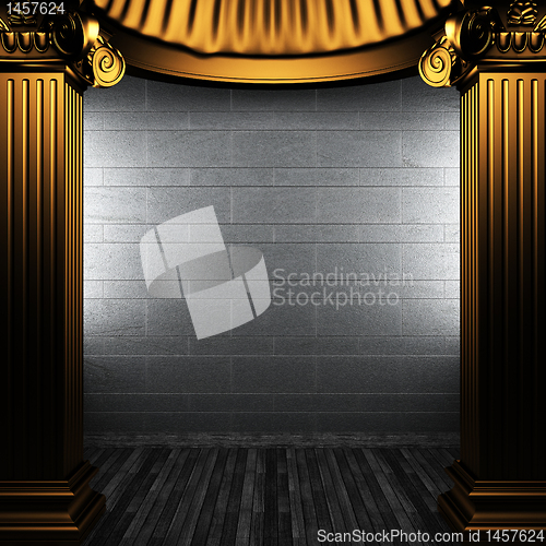 Image of bronze columns and wall
