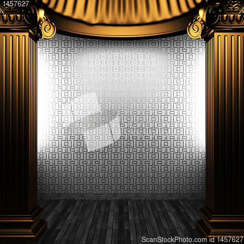 Image of bronze columns and tile wall
