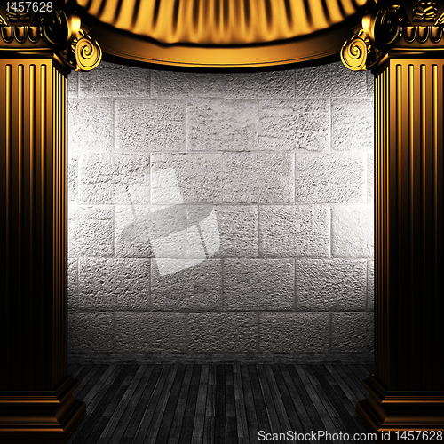 Image of bronze columns and wall