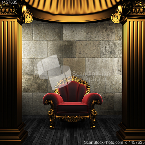 Image of bronze columns and chair