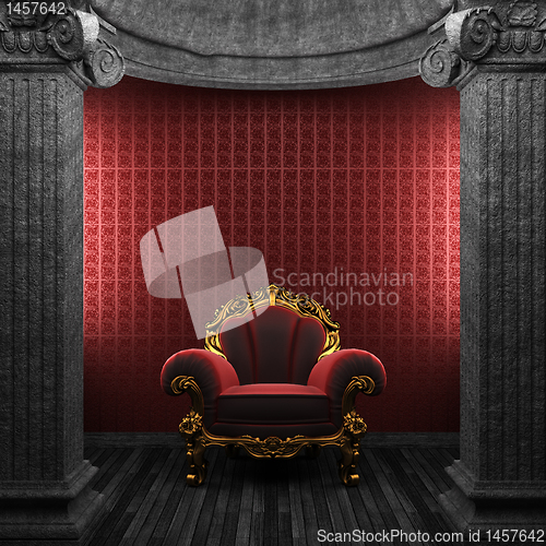 Image of stone columns, chair and wallpaper