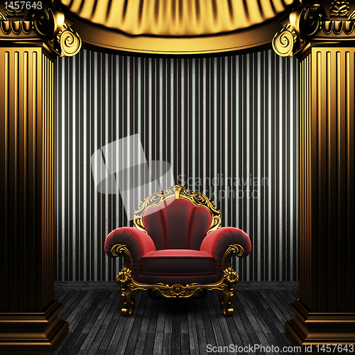 Image of bronze columns, chair and wallpaper