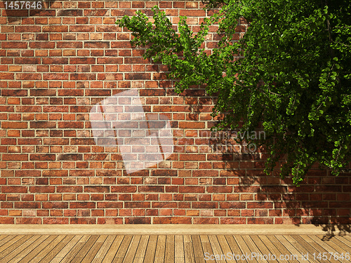 Image of illuminated brick wall and ivy