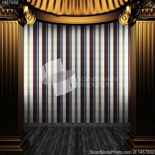 Image of bronze columns and tile wall