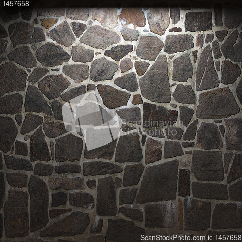 Image of illuminated stone wall