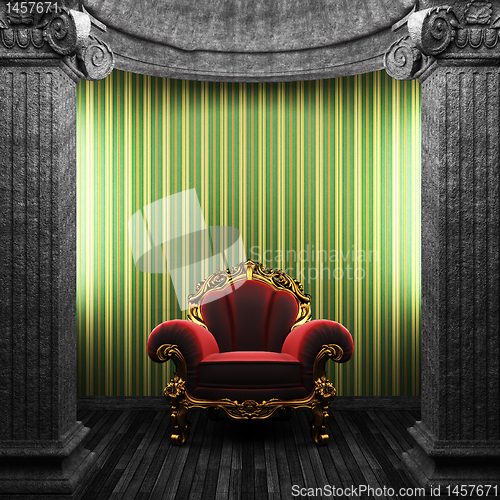 Image of stone columns, chair and wallpaper