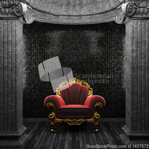 Image of stone columns, chair and tile wall
