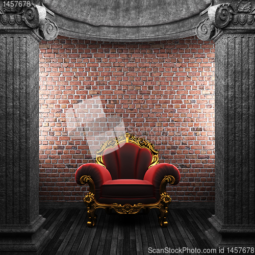 Image of stone columns and chair