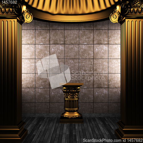 Image of bronze columns, pedestal and tile wall