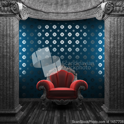 Image of stone columns, chair and tile wall