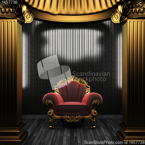Image of bronze columns, chair and tile wall