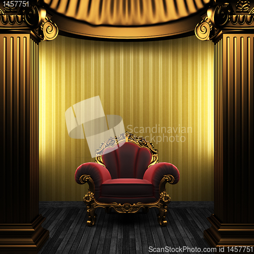 Image of bronze columns, chair and wallpaper