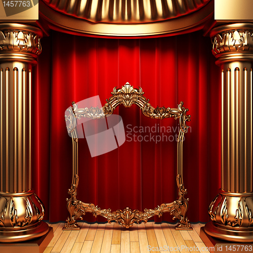 Image of red curtains, gold columns and frames