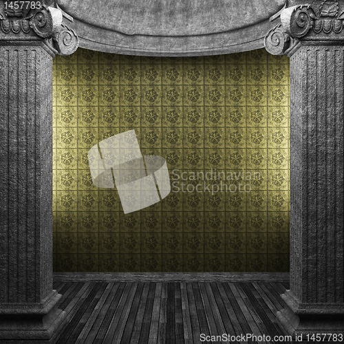 Image of stone columns and tile wall