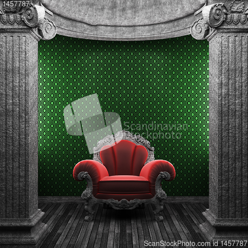 Image of stone columns, chair and wallpaper