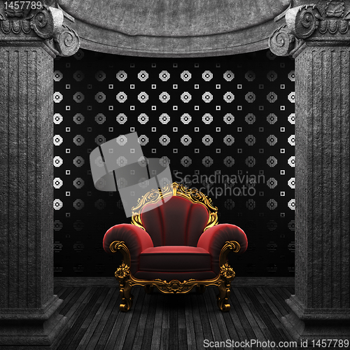 Image of stone columns, chair and tile wall