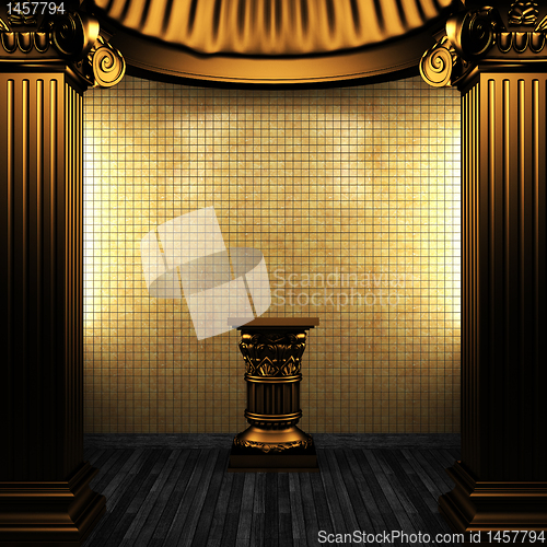 Image of bronze columns, pedestal and tile wall