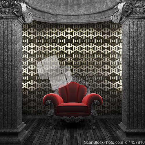 Image of stone columns, chair and tile wall