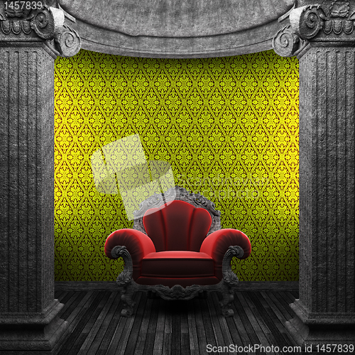 Image of stone columns, chair and wallpaper
