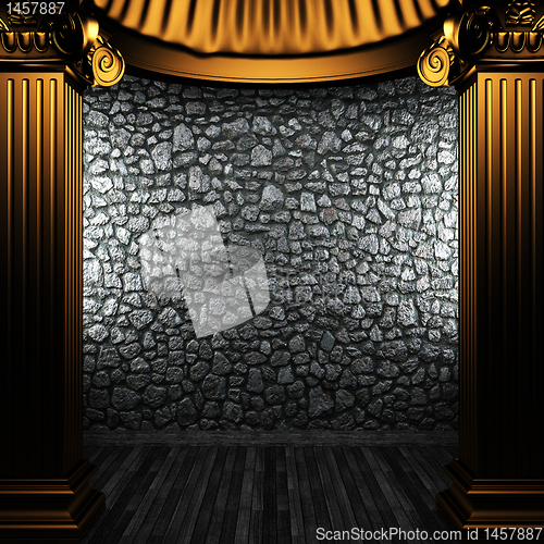Image of bronze columns and wall