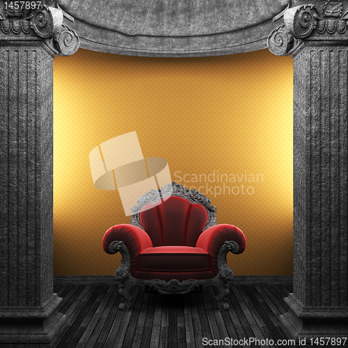Image of stone columns, chair and wallpaper