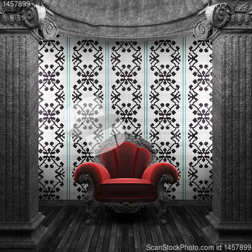 Image of stone columns, chair and tile wall