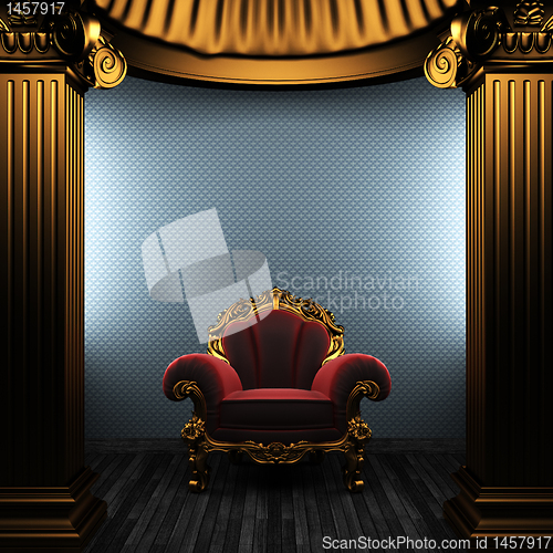 Image of bronze columns, chair and wallpaper