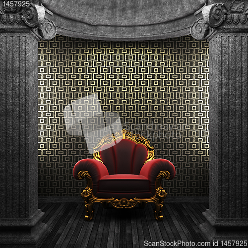 Image of stone columns, chair and tile wall