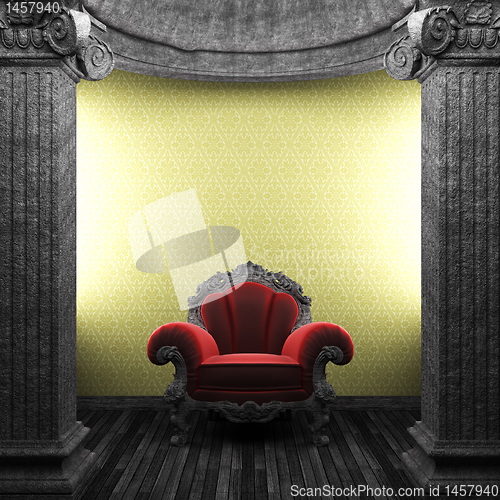 Image of stone columns, chair and wallpaper
