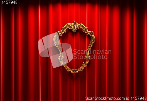 Image of red curtains, gold frame