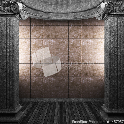 Image of stone columns and tile wall