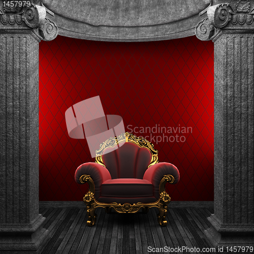 Image of stone columns, chair and wallpaper
