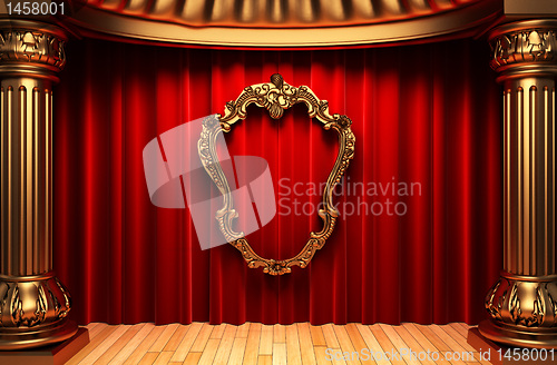 Image of red curtains, gold columns and frames