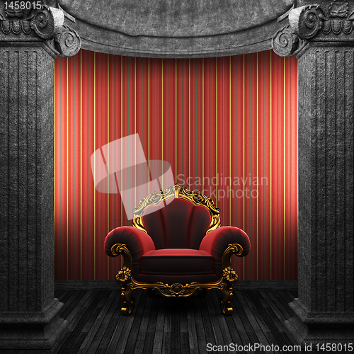 Image of stone columns, chair and wallpaper