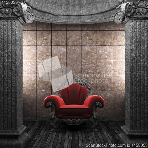 Image of stone columns, chair and tile wall