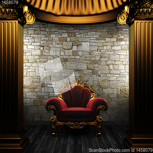 Image of bronze columns and chair