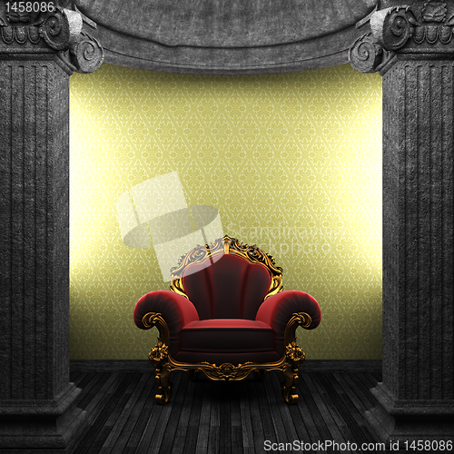 Image of stone columns, chair and wallpaper