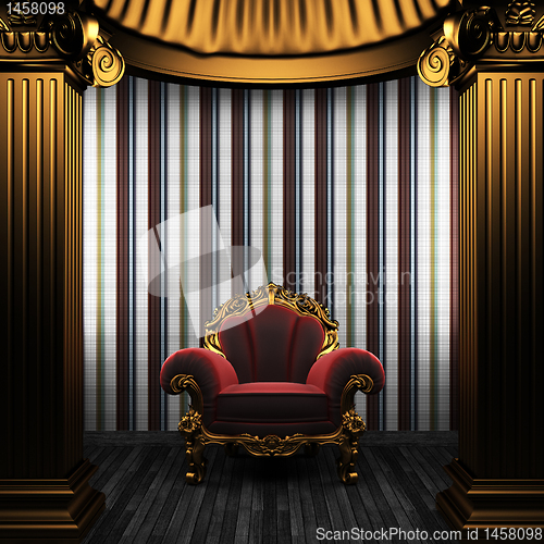 Image of bronze columns, chair and tile wall