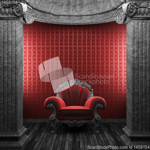 Image of stone columns, chair and wallpaper