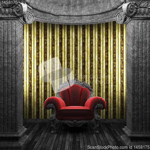 Image of stone columns, chair and wallpaper