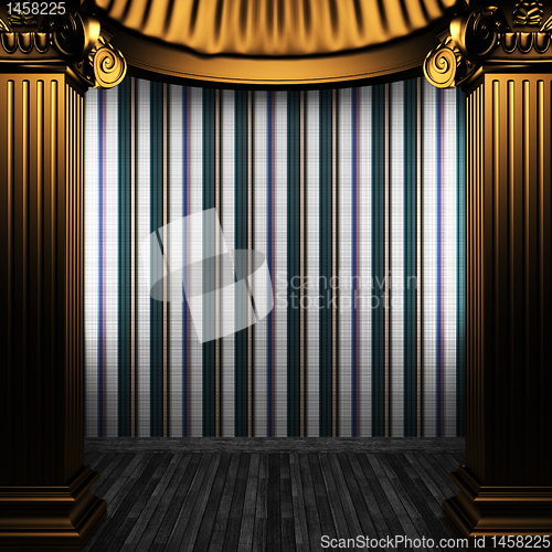 Image of bronze columns and tile wall