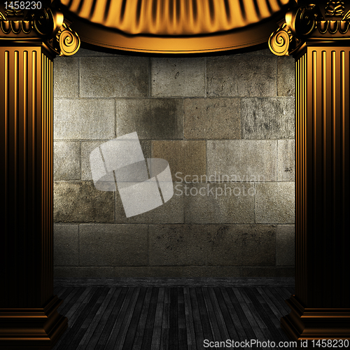 Image of bronze columns and wall