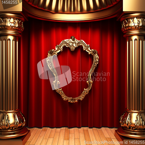 Image of red curtains, gold columns and frames