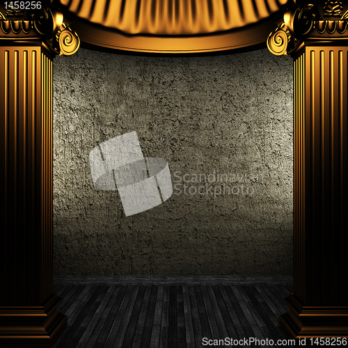 Image of bronze columns and wall