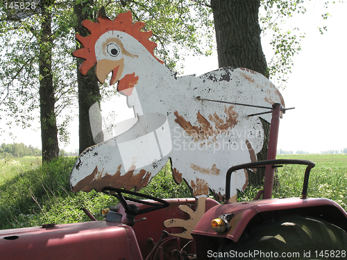 Image of chicken on tractor