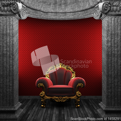 Image of stone columns, chair and wallpaper