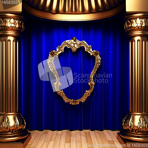 Image of blue curtains, gold columns and frames